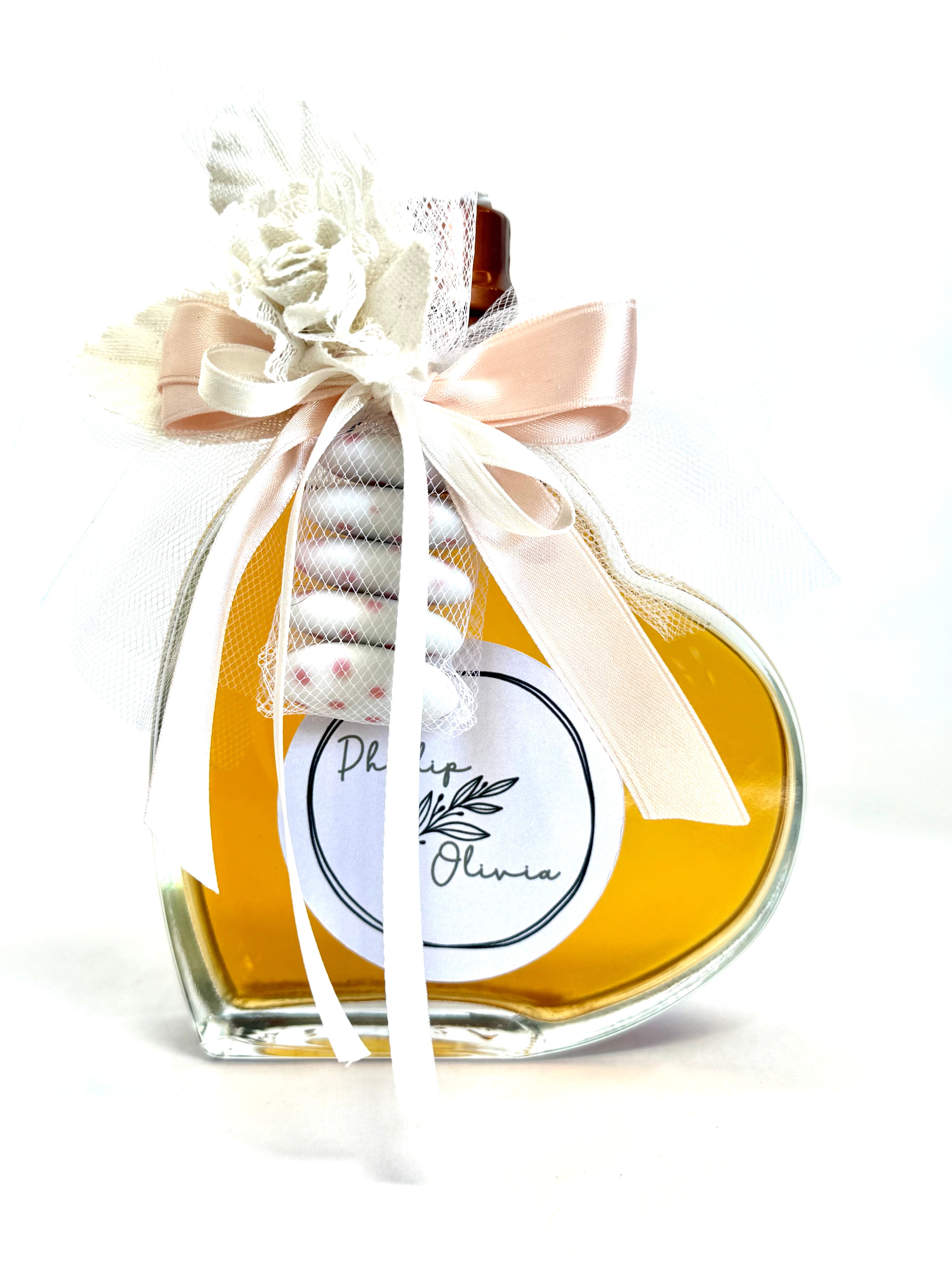 Bomboniera Bottiglia di vetro cuore 20cl genziana con confetti